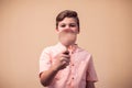 A portrait of kid boy holding magnifier. Children and knowlage concept Royalty Free Stock Photo