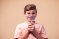 A portrait of kid boy holding magnifier. Children and knowlage concept Royalty Free Stock Photo