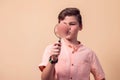 A portrait of kid boy holding magnifier. Children and knowlage concept Royalty Free Stock Photo