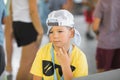 Portrait kid boy looking out with thinking face, children play on in the summer camp Royalty Free Stock Photo