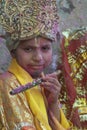 Portrait of a Kid dressed as a Lord krishna at barsana during Holi Festival,UttarPradesh,India