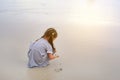 Portrait Kid girl playing sand at the beach Royalty Free Stock Photo