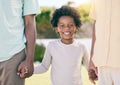 Portrait of kid, smile and holding hands of parents, happy in backyard garden and support, trust and love in adoption Royalty Free Stock Photo