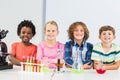 Portrait of kids doing a chemical experiment in laboratory Royalty Free Stock Photo