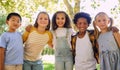 Portrait, kids and a group of friends standing in a line together outdoor, feeling happy while having fun. Diversity Royalty Free Stock Photo