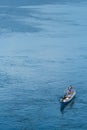 Portrait, Kids on small boats on Komodo Island bay, Indonesia