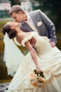 Portrait of kissing newlyweds