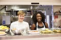 Portrait Of Kitchen Staff In Homeless Shelter Royalty Free Stock Photo