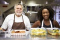 Portrait Of Kitchen Staff In Homeless Shelter Royalty Free Stock Photo