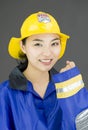 Portrait of a lady firefighter celebrating success