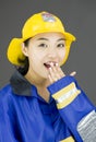 Portrait of a lady firefighter looking shocked