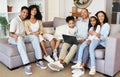 Portrait, laptop and a black family in the living room of a home together, sitting on a sofa. Love, internet or bonding Royalty Free Stock Photo
