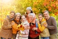 Portrait of a large family of seven in autumn