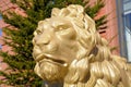 Portrait of a large golden lion statue