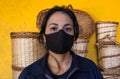 Portrait of Latin artisan woman with mask