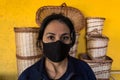 Portrait of Latin artisan woman with mask