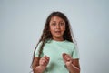 Portrait of latin little girl looking at camera