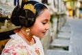 Portrait of a latina fallera girl wearing the traditional valencian costume of Fallas Royalty Free Stock Photo