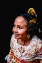 Portrait of a latina fallera girl wearing the traditional valencian costume of Fallas Royalty Free Stock Photo