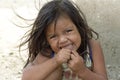 Portrait of Latino girl brushing her teeth, Nicaragua