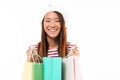 Portrait of a laughing asian girl in christmas hat Royalty Free Stock Photo