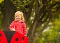 Portrait of laughing baby with red umbrella Royalty Free Stock Photo