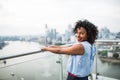 A portrait of a woman standing on a terrace in London. Copy space. Royalty Free Stock Photo