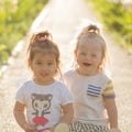 Portrait of a laughing girl with Down syndrome and girlfriends Royalty Free Stock Photo