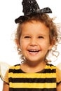 Portrait of laughing girl in striped bee costume Royalty Free Stock Photo