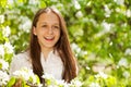 Portrait of laughing girl with white pear flowers Royalty Free Stock Photo