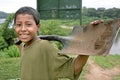 Portrait of laughing Indian boy with spade, Nicaragua Royalty Free Stock Photo