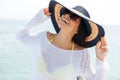 Portrait of a laughing woman wearing beach hat and bikini Royalty Free Stock Photo