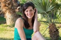 Portrait of laughing young woman relaxing on grass Royalty Free Stock Photo