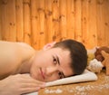 Portrait of laying young smiling relaxing boy