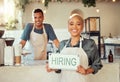 Portrait, leader and hiring sign small business owner happy at coffee shop or cafe with employee. Team, collaboration Royalty Free Stock Photo