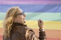 Portrait of a lesbian latin woman wearing lgbt wristband