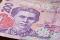 Portrait of Lesya Ukrainka in 200 hryvnia banknotes. Ukrainian paper bank notes, close-up