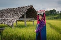 Portrait of Lisu girl in traditional dress in the rice fields Royalty Free Stock Photo