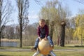 Portrait of a litte blond boy on playground