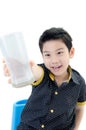 Portrait of Little asian boy drinking a glass of milk Royalty Free Stock Photo