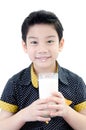 Portrait of Little asian boy drinking a glass of milk Royalty Free Stock Photo