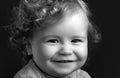 Portrait of little baby. Concept of kids face close-up. Head shoot children portrait. Smiling infant, cute smile.