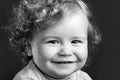 Portrait of little baby. Concept of kids face close-up. Head shoot children portrait. Smiling infant, cute smile.