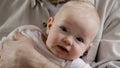 Portrait little baby girl cute small boy newborn blue-eyed child infant looking at camera. Unrecognizable father man Royalty Free Stock Photo