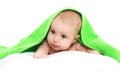 Portrait of little baby under towel lying Royalty Free Stock Photo