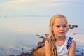 Portrait of little beautiful girl on sunset Royalty Free Stock Photo