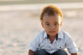 Portrait of little biracial boy. Cute mixed race little kid having fun on a beach vacation Royalty Free Stock Photo