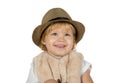 Portrait of a little blonde girl wearing a hat and a fur vest Royalty Free Stock Photo