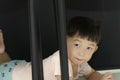 Little boy crawling under the chair.Playful time