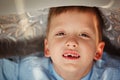 Portrait little boy in fall missing his first milk tooth. Royalty Free Stock Photo